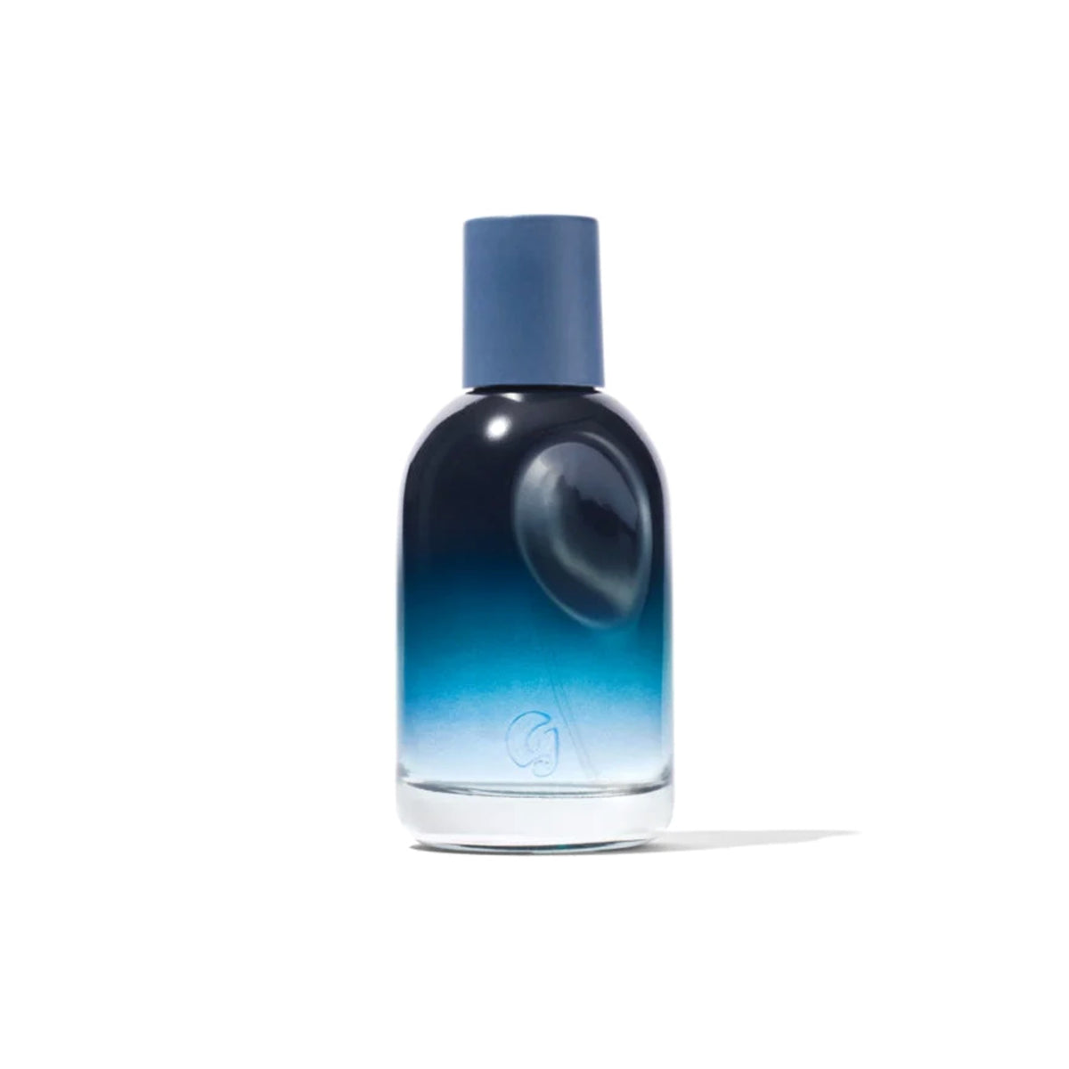 Glossier You Soie navy-to-blue gradient bottle on a white background