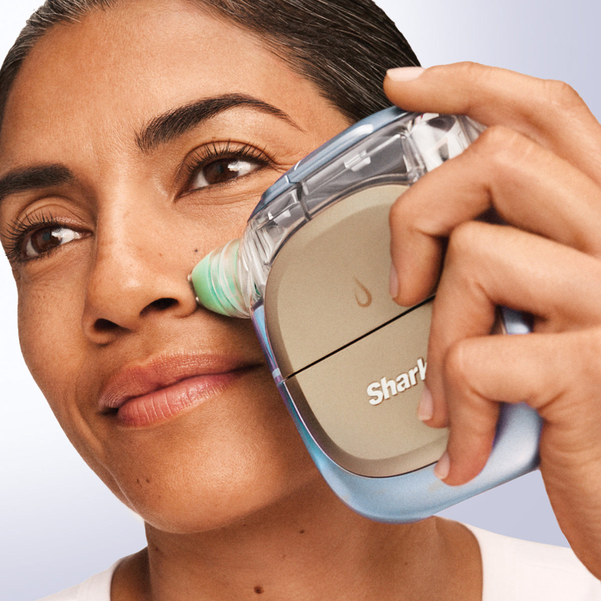 Using Shark FacialPro Glow hydro-extraction on the nose