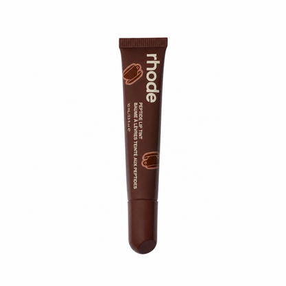 Brown cosmetic tube with 'rhode' branding on a white background