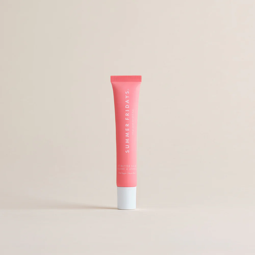 Pink tube of 'Summer Fridays' product on a beige background