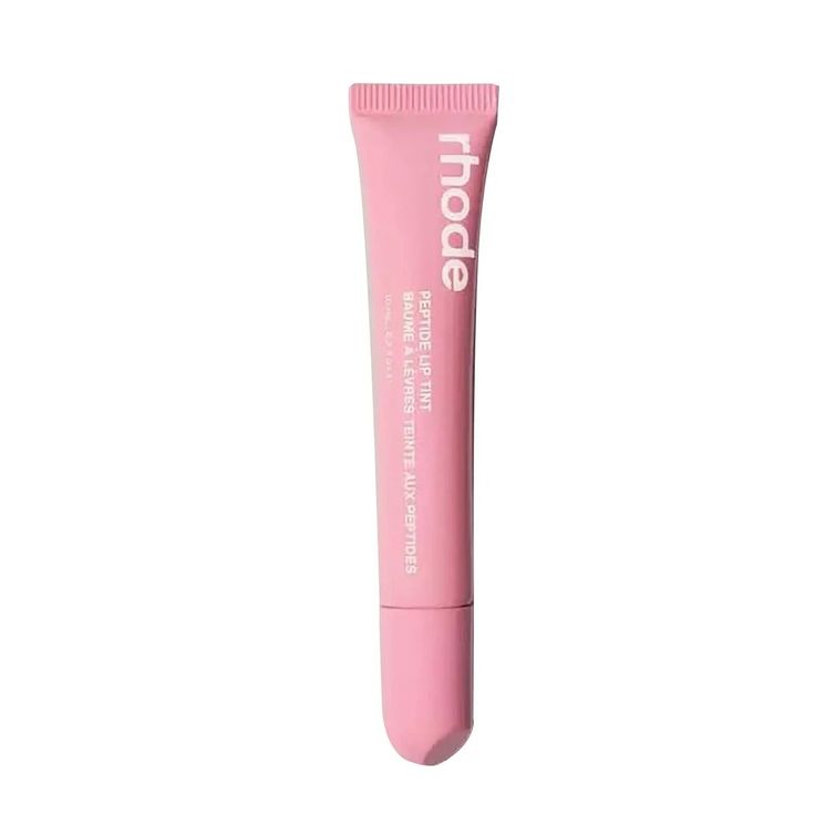 Pink lip balm tube with 'rhode' branding on a white background