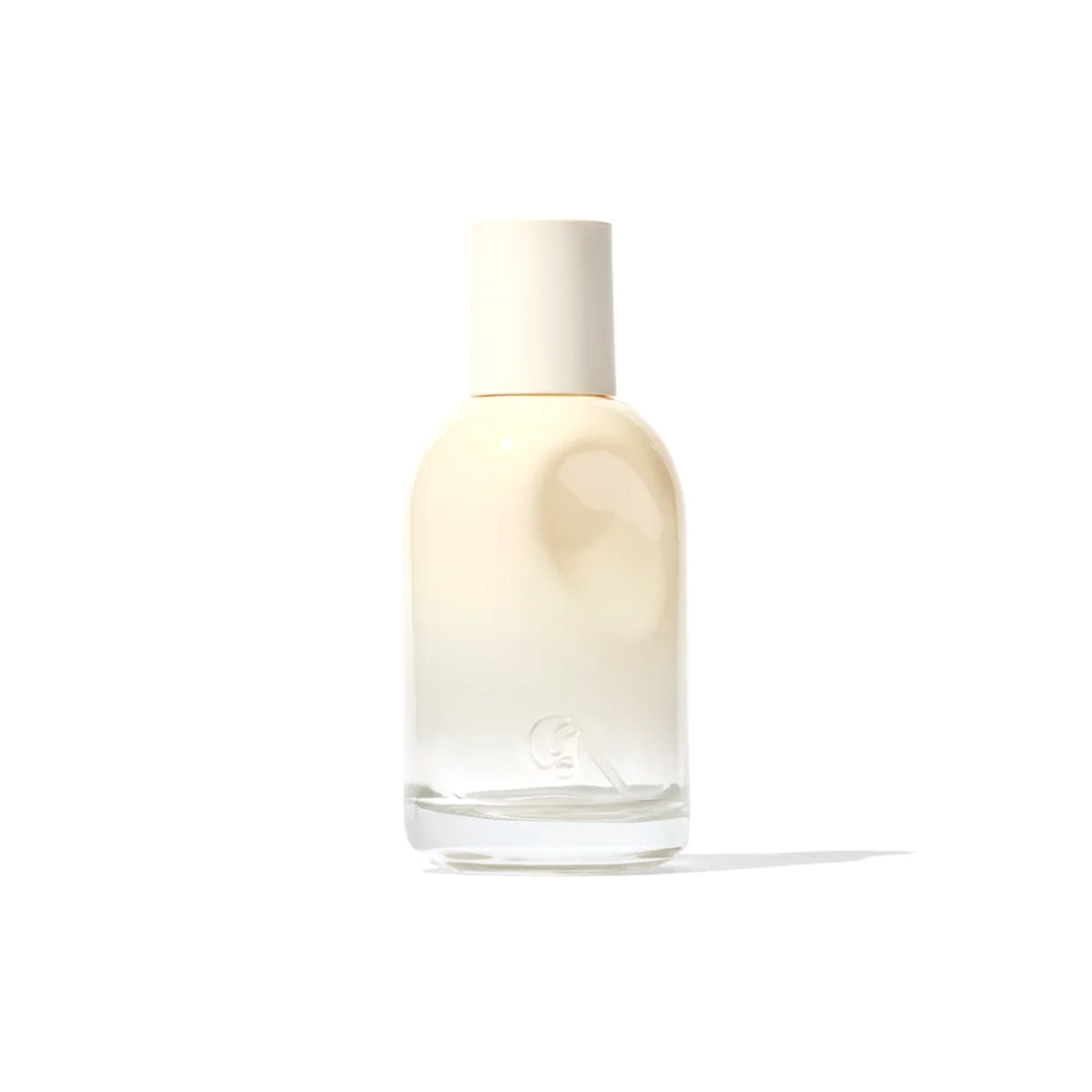 Glossier You Doux cream gradient bottle on a white background