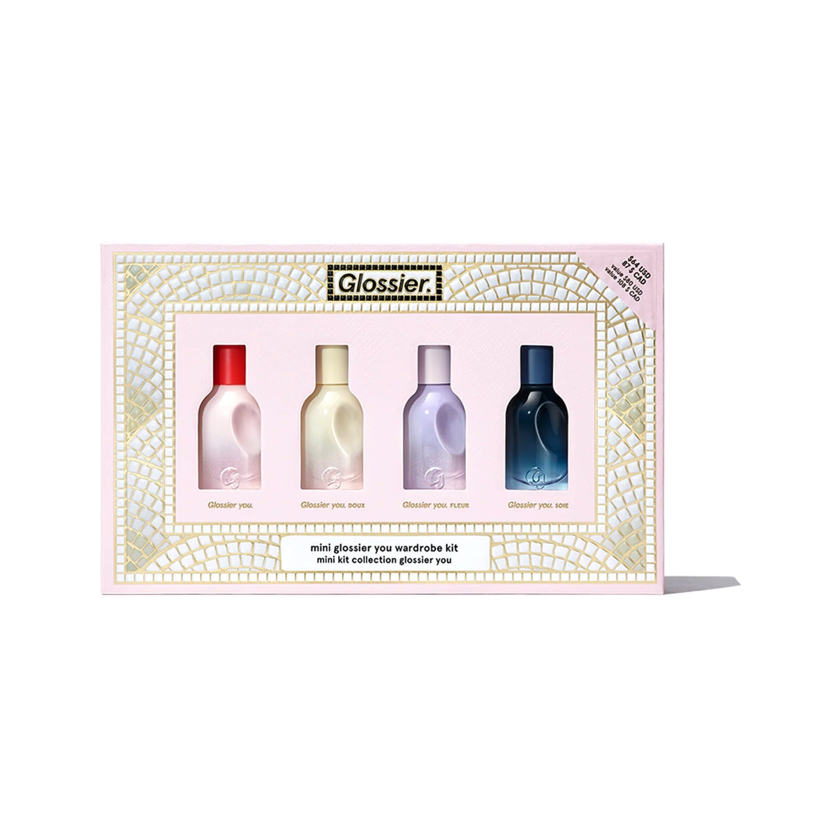 Mini Glossier You Wardrobe Kit set box with four mini fragrance bottles on a white background