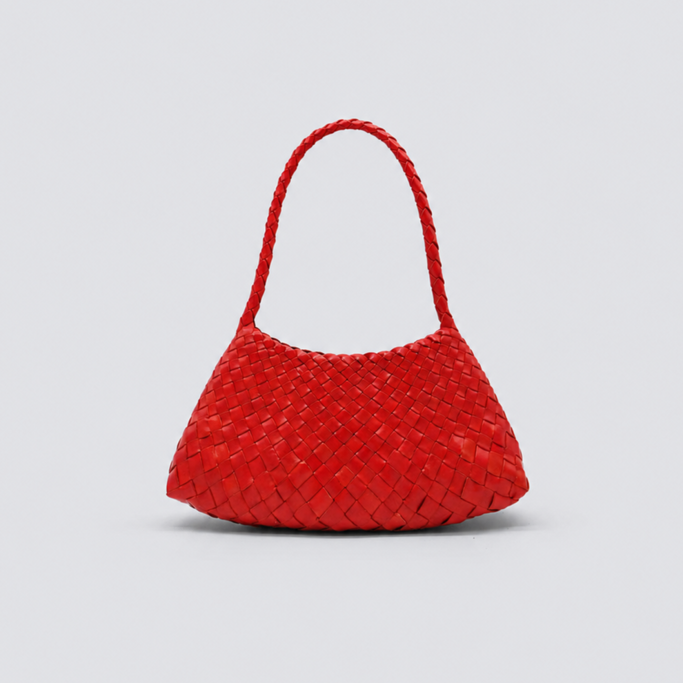 Red woven handbag on a light gray background