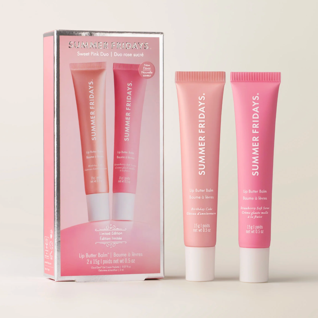 Two pink lip butter tubes with 'Summer Fridays' branding next to their packaging on a light background.