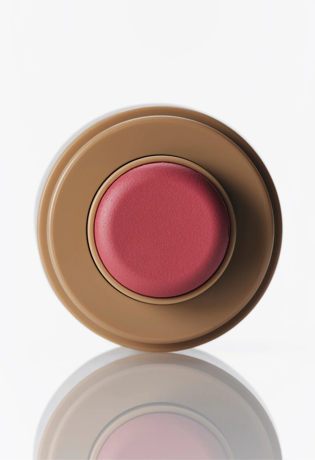 Pink blush compact on a white background
