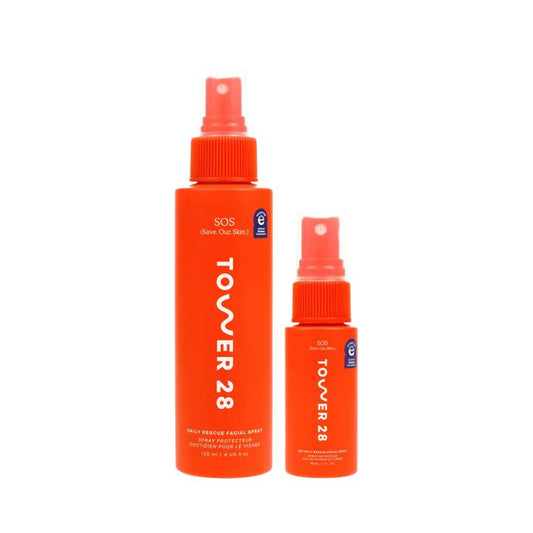 Two orange bottles of Tower 28 product on a white background